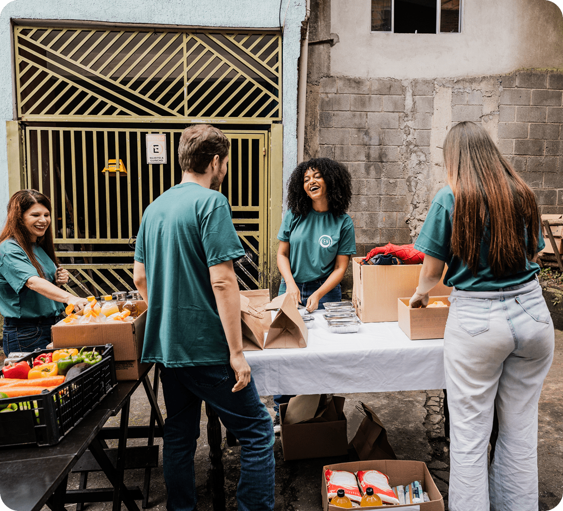 People packing boxes at donation event