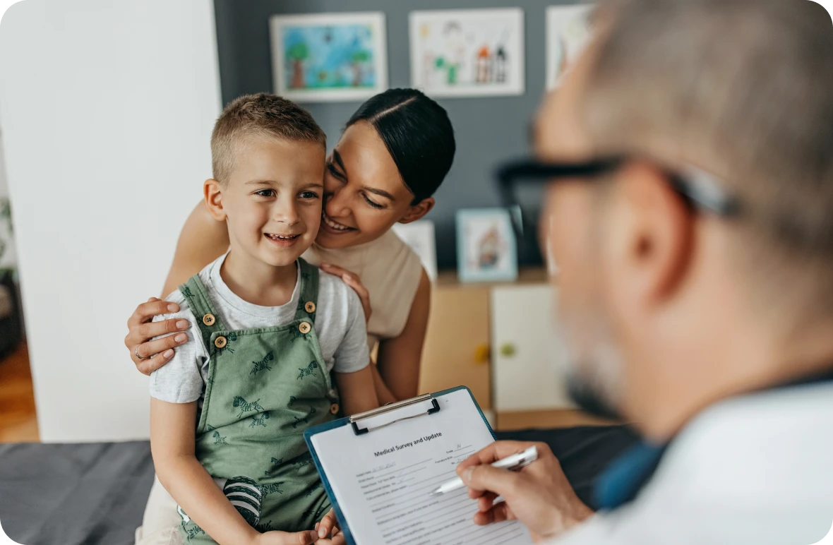 Child at doctor's appointment with parent