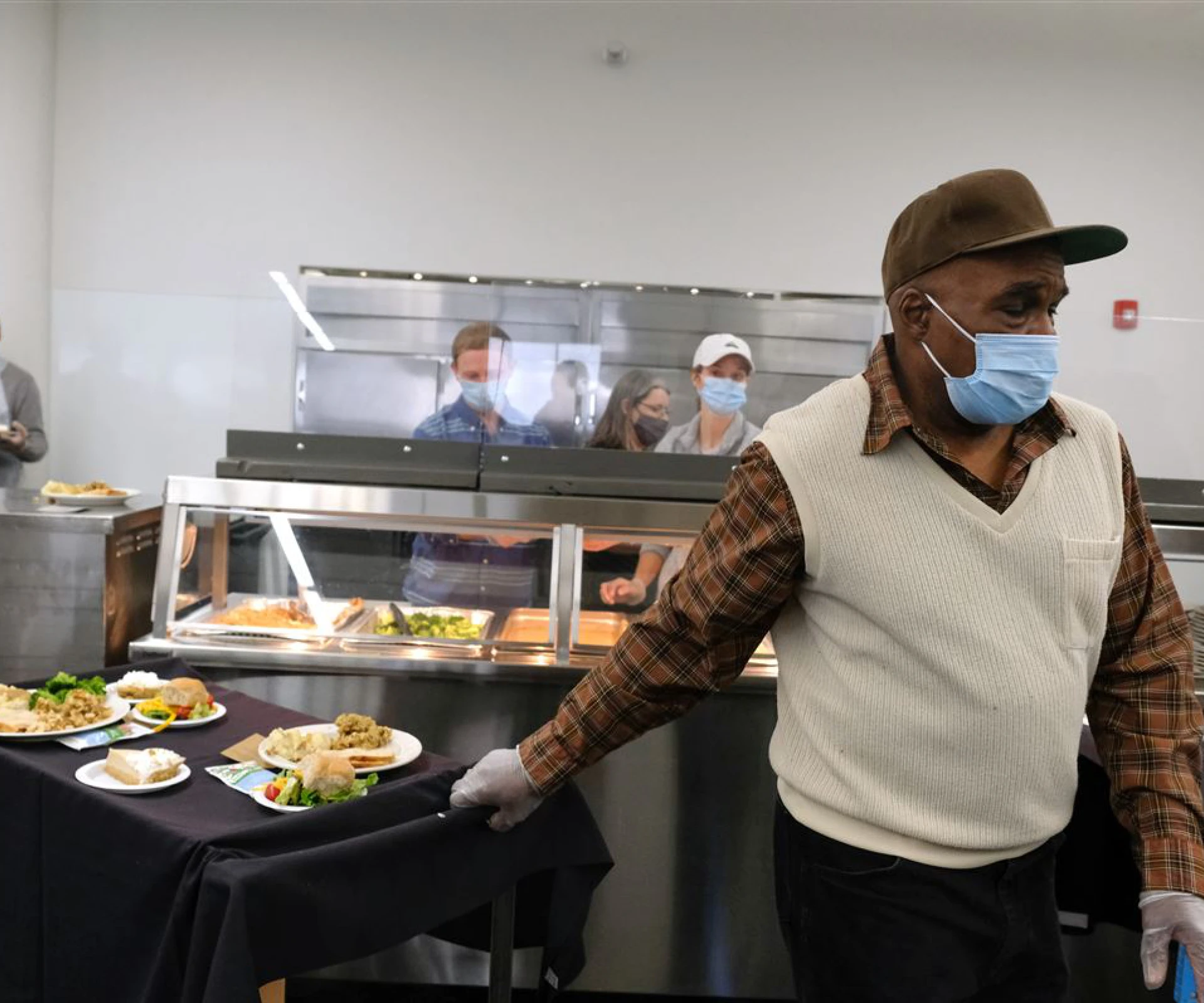 Cafeteria worker wearing a mask